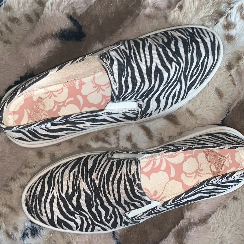 Roxy Zebra Print Platform Slip-On Sneakers in Black and Cream